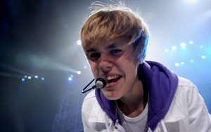 Justin-Bieber-teen-mic-300x188 Young and Strong - The Life and Career of Justin Bieber